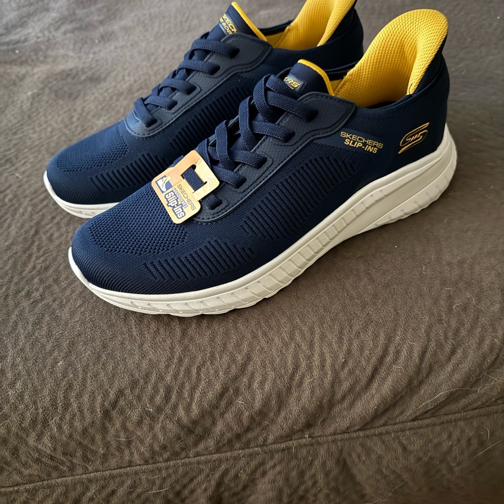 Skechers Navy Slip-On Sneakers with Yellow Lining